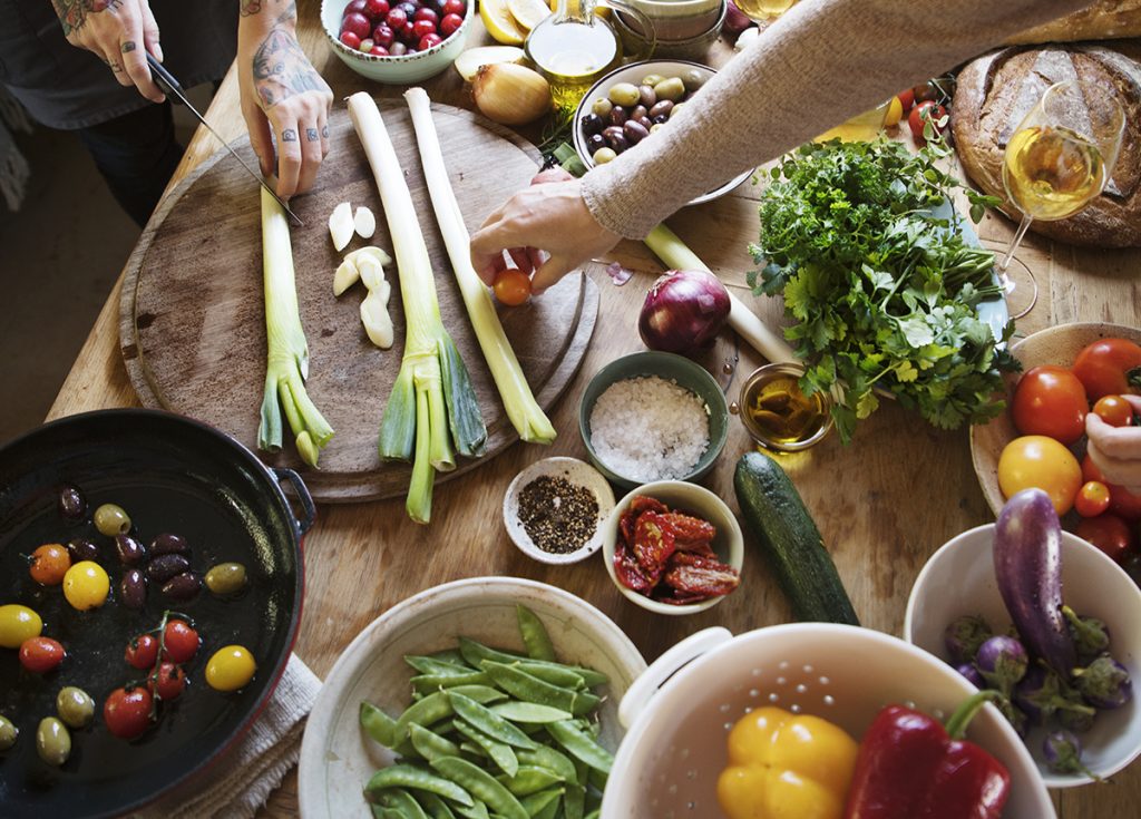 people cooking healthy food